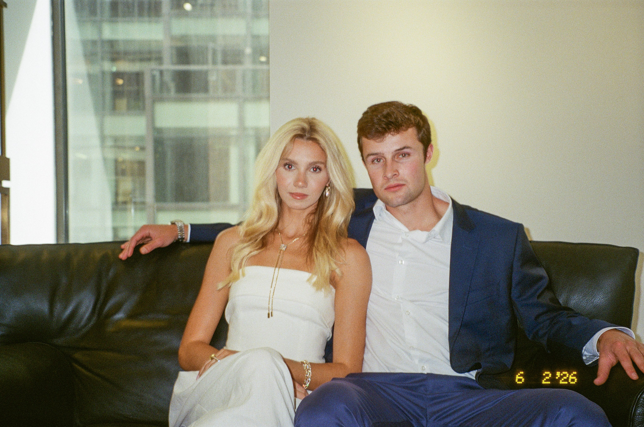 Cooke and Berlinger summer collection seated couple on film