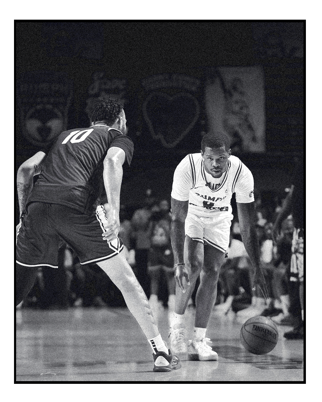 Black and white Danny Rumph Classic one on one dribble scene
