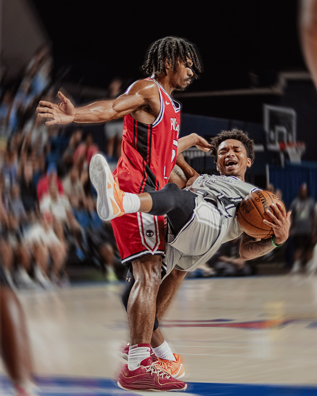 Danny Rumph Classic player taking contact while driving to the basket
