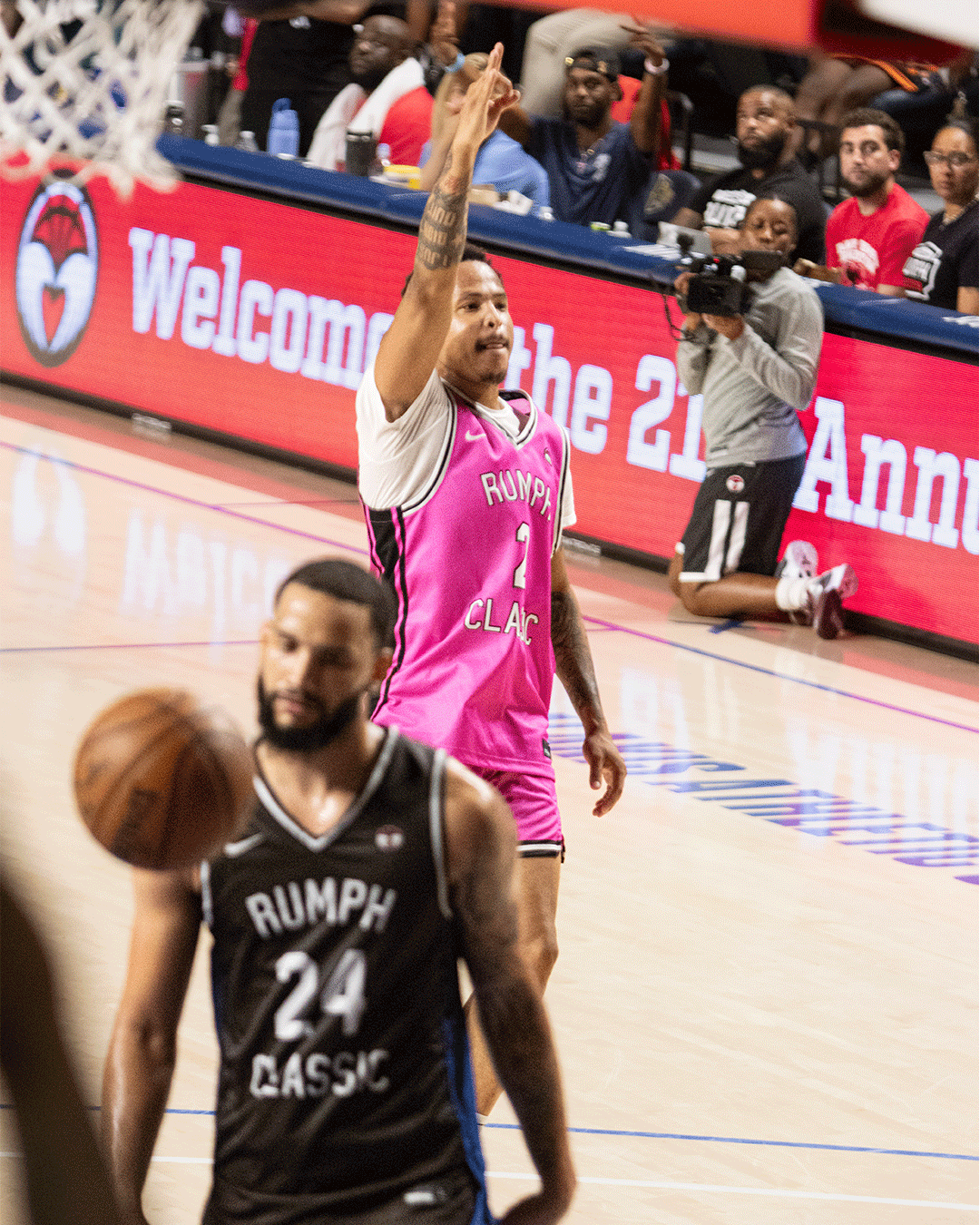 Danny Rumph Classic pink jersey player pointing on the court