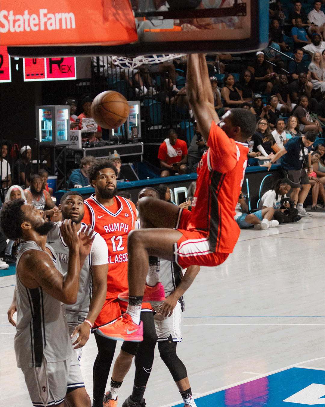 Danny Rumph Classic red jersey player dunking in traffic