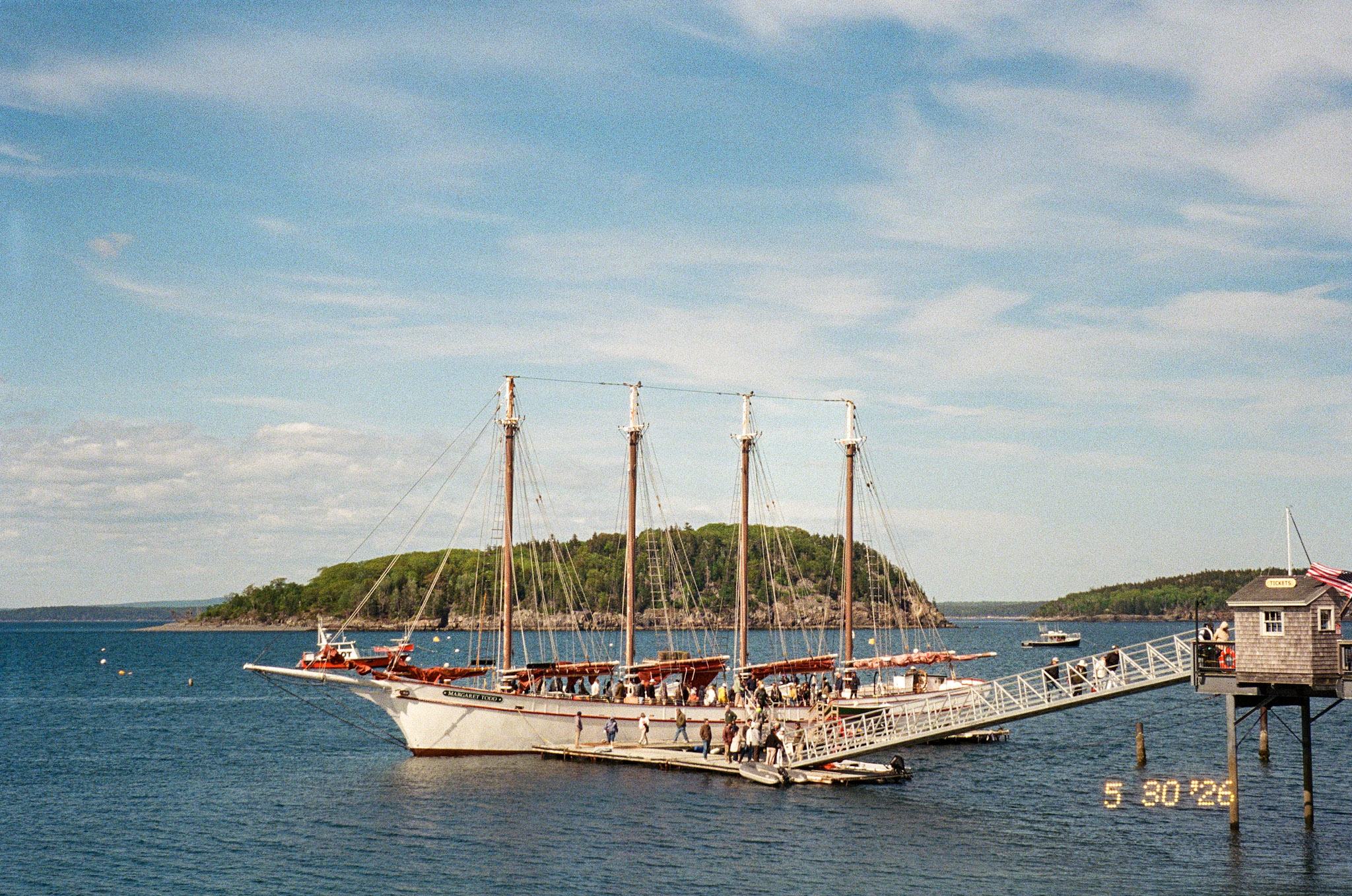 Schooner docked in a harbor on film