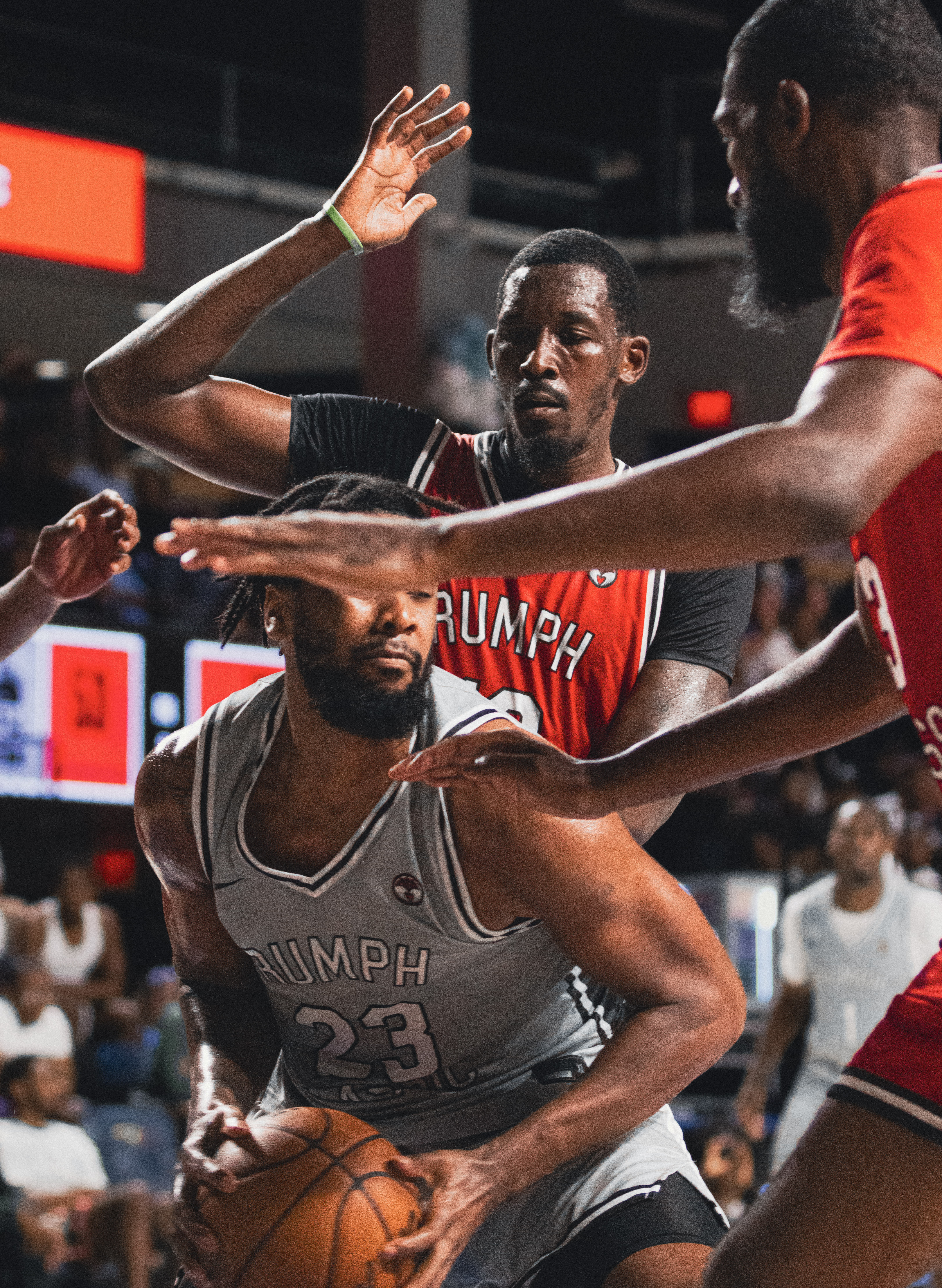 Danny Rumph Classic player working through paint pressure in a red jersey