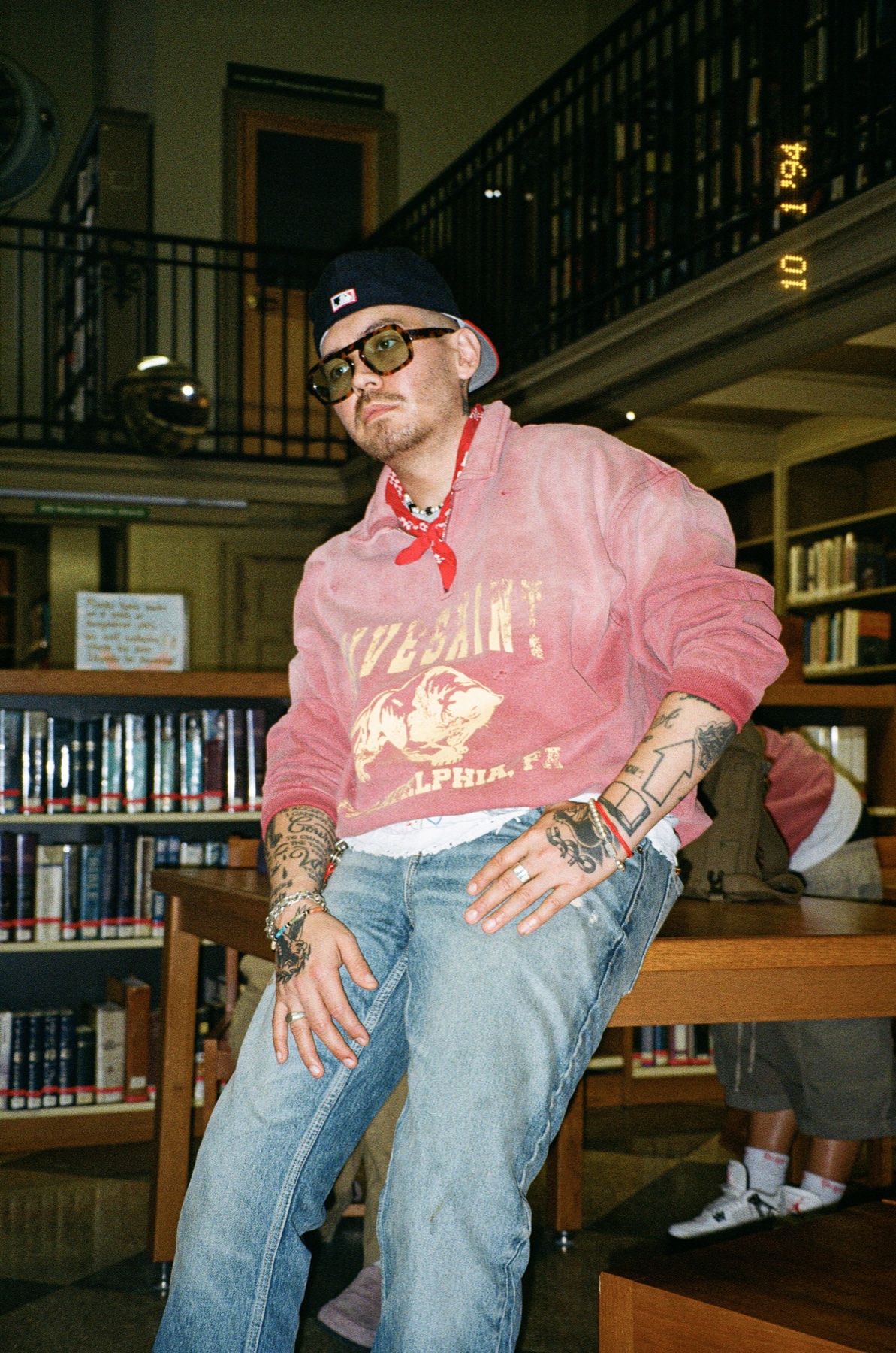 Fith & Saint seated streetwear portrait