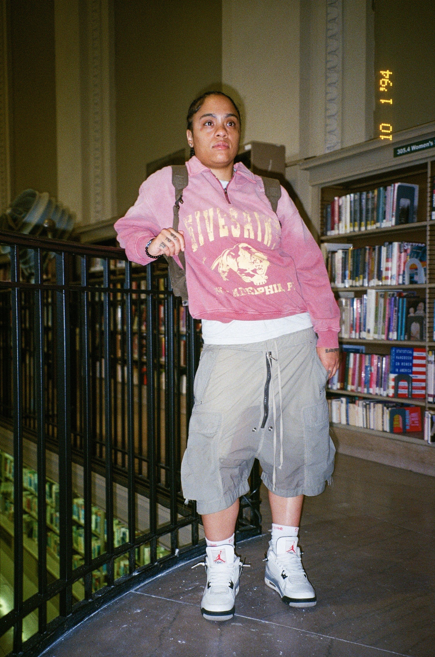 Fith and Saint full body pink sweatshirt portrait