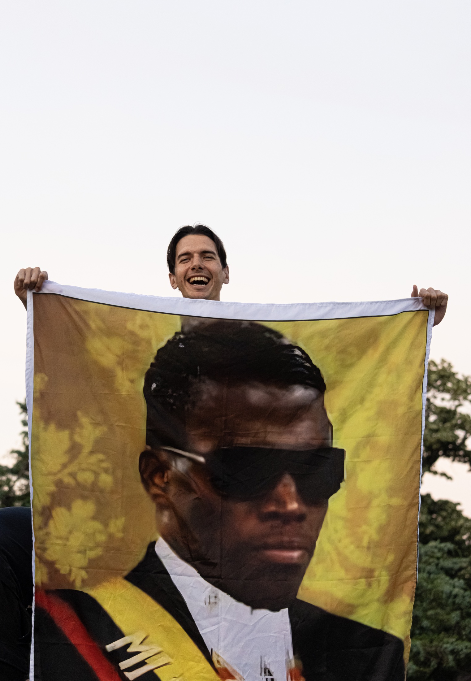 Ecuadorian supporter holding a player flag